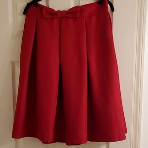 Red skirt size xl with bow detail at the waist